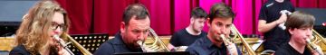 Žesťová sekce orchestru při koncertu